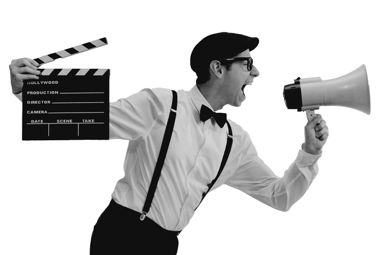Film director shouting into a megaphone.