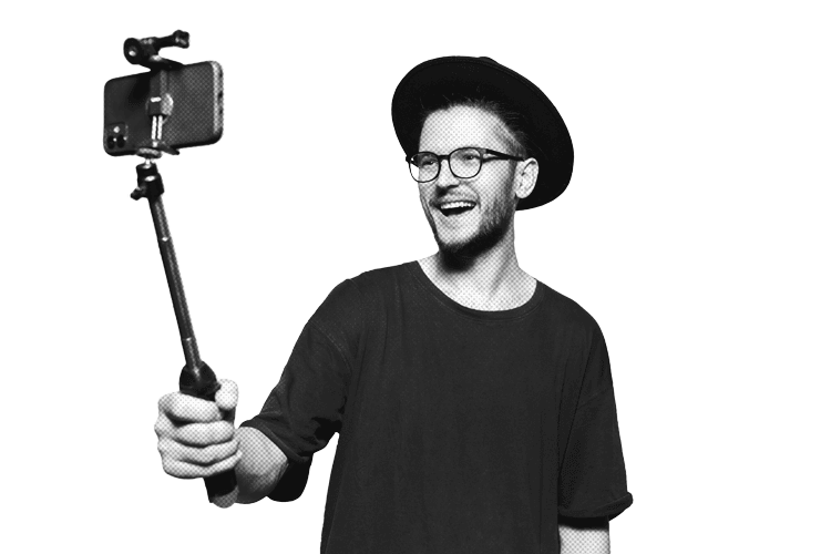 Man with selfie stick taking a picture.