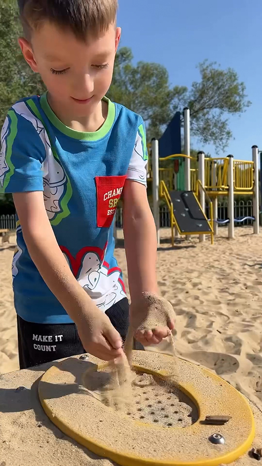 For Paramount campaign,a small child plays in a sand pit wearing Spongebob themed adaptive clothes.