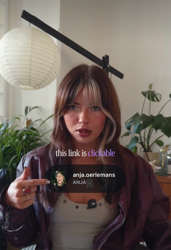 Content creator pointing to a link in the centre of the frame, linking to their own Instagram channel - anja.oerlemans Text above reads: "This link is clickable."