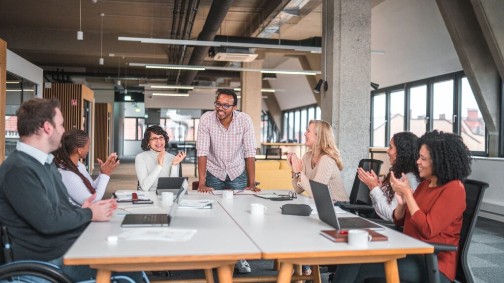 A marketing team sat around a table discussing ideas.