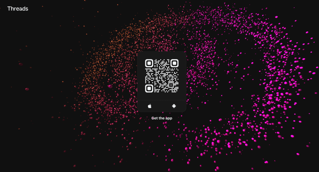 A screenshot of the official Threads website. The background consists of pink and orange circles arranged in a galaxy pattern. Over the top is a QR code that prompts the user to download Threads on their mobile device.