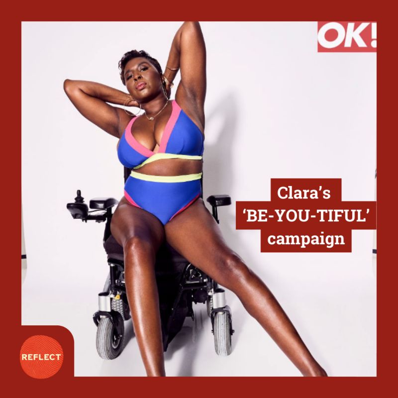 Clara Holmes, a black woman with short brown hair, is sat on her powered wheelchair, posing to the camera on a blue, pink and green underwear set.
