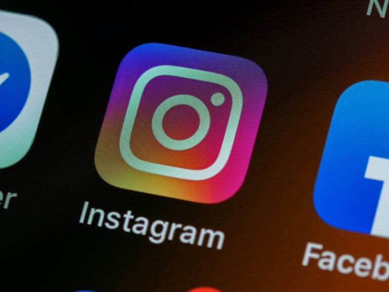 A close-up of the Instagram app icon on a digital screen.