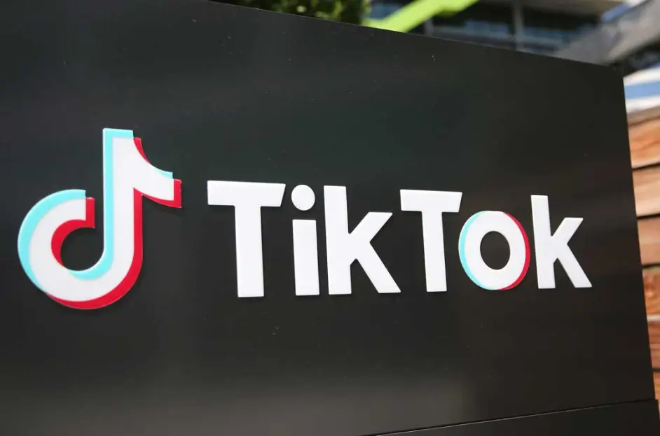 An image of the TikTok logo in a black background.