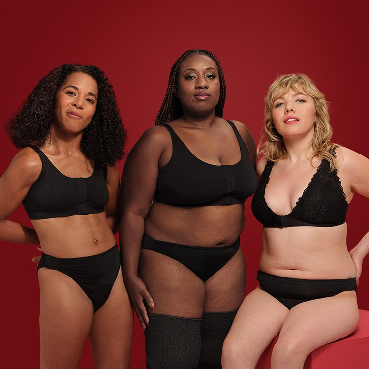 Three disabled models posing with the new adaptive underwear collection from Primark. 